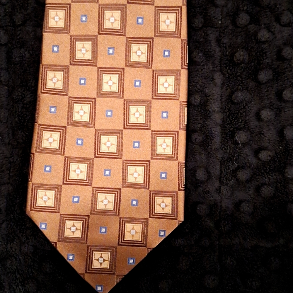 Insignia by martin wong  Bronze squares with star blue boxes 60" length 4" wide